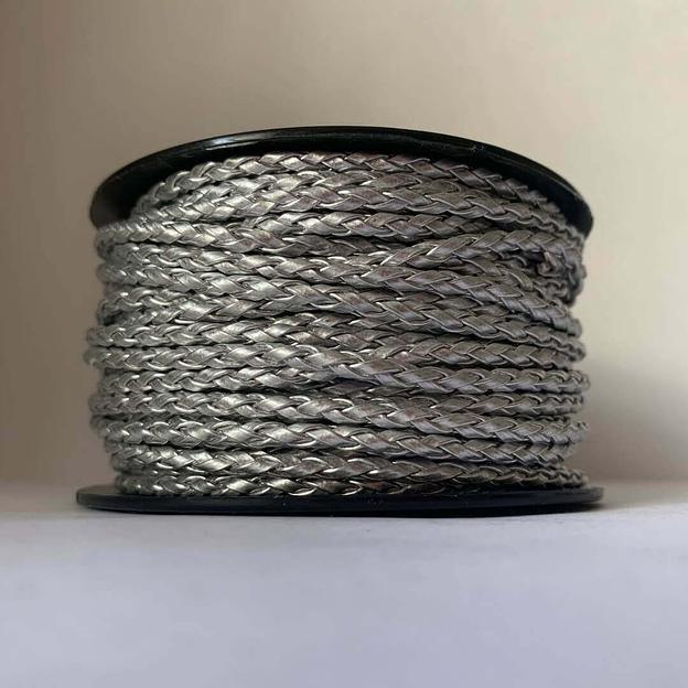Шнур-косичка из искусственной кожи серебро, 25 м опт фото 1