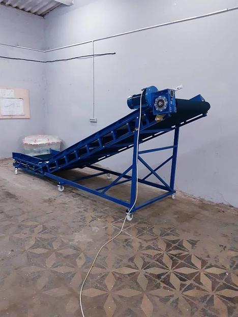 Погрузочно-разгрузочный конвейер для коробок и мешков фото 3