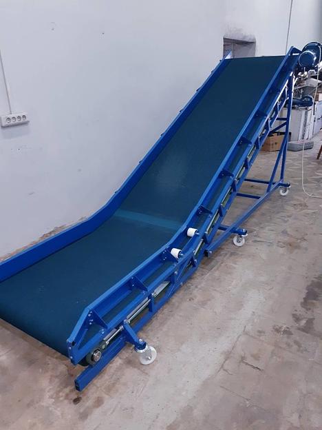 Погрузочно-разгрузочный конвейер для коробок и мешков фото 2