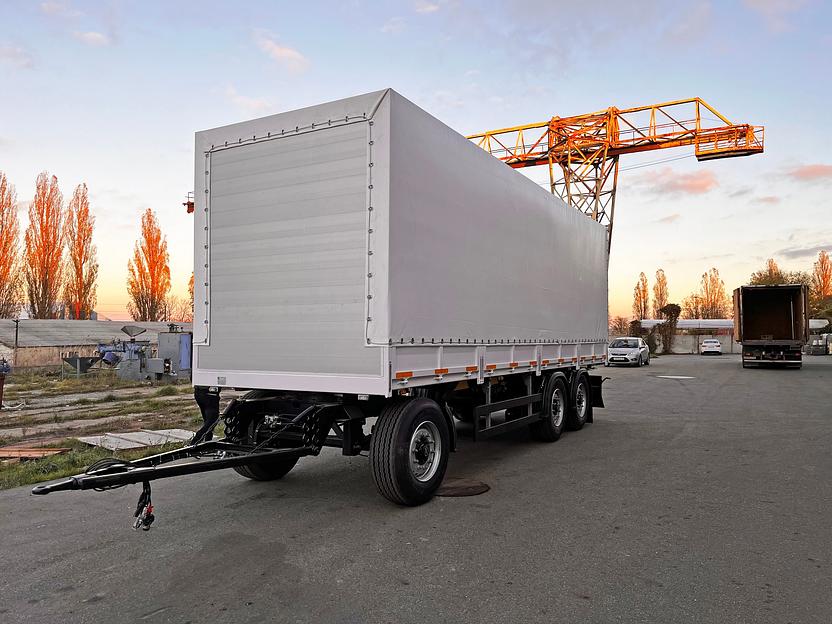 Прицеп бортовой тентованный трехосный фото 5