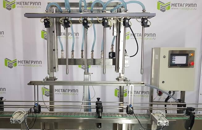 Автомат розлива спокойных и пенящихся жидкостей в тару 0,5 – 10,0 л АР-800Р-МГ (6 голов, с расходомерами, с опусканием) фото 1