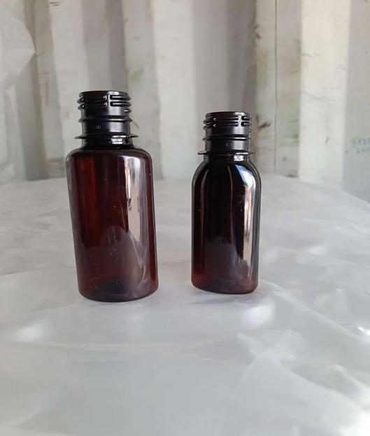 Бутылка овальная коричневая 50 мл, 28 мм ПЭТ фото 1