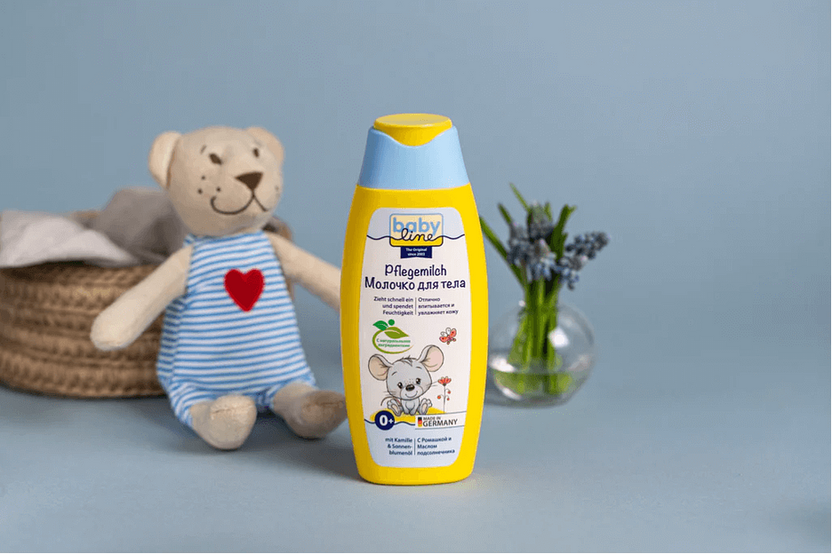 Молочко для тела и ухода за кожей ребенка с экстрактом ромашки и подсолнечника Babyline 250 мл ОПТ фото 3
