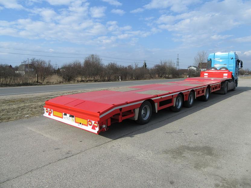 Трал низкорамный раздвижной четырехосный фото 2