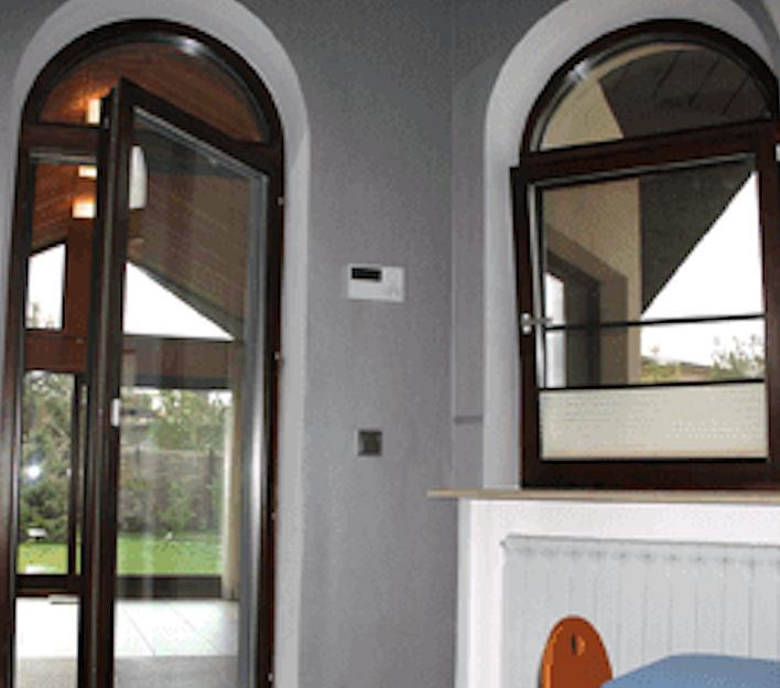 Нестандартные конструкции арочных окон фото 6