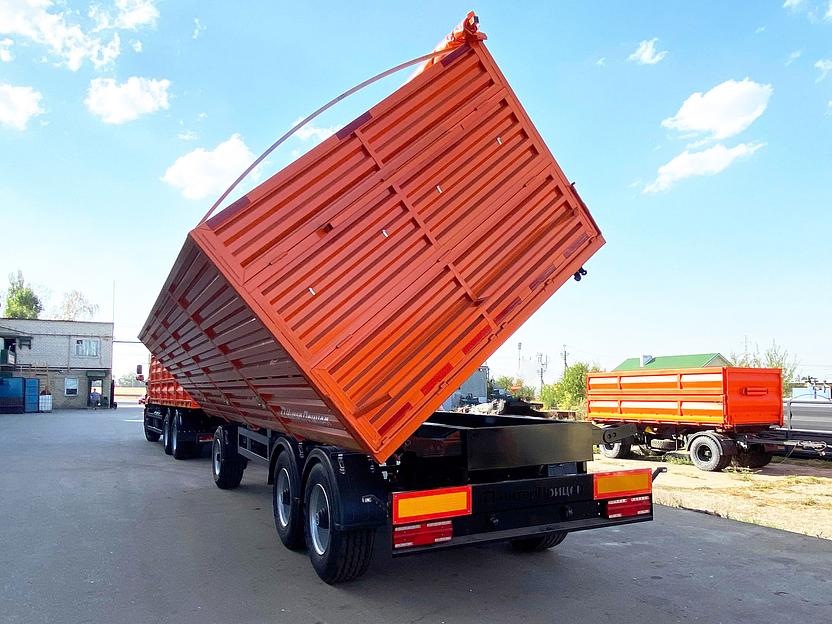 Прицеп зерновоз самосвальный трехосный фото 3