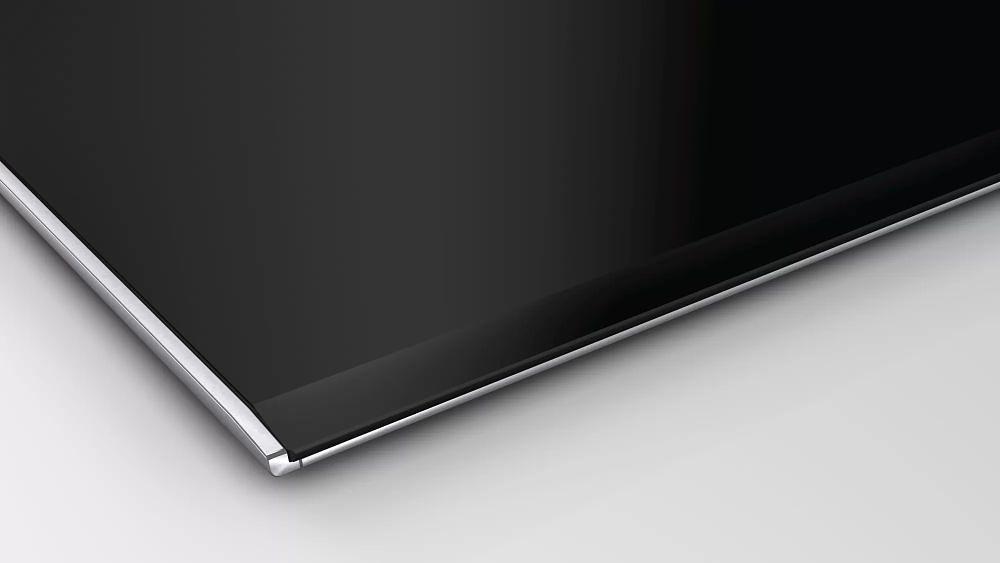 Индукционная варочная поверхность Bosch PXX875D67E черный фото 4