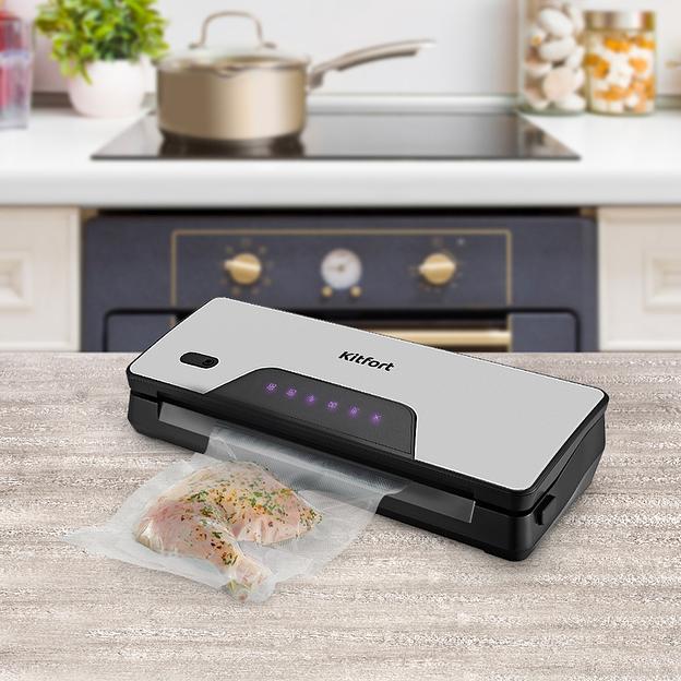 Вакуумный упаковщик Kitfort КТ-1517 130Вт серебристый/черный фото 8