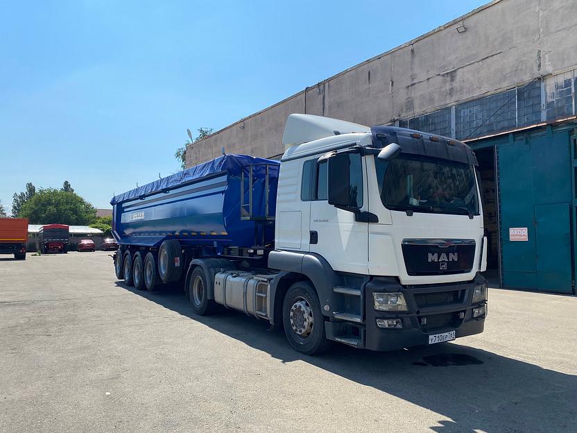 Полуприцеп самосвальный четырехосный с задним свалом фото 1