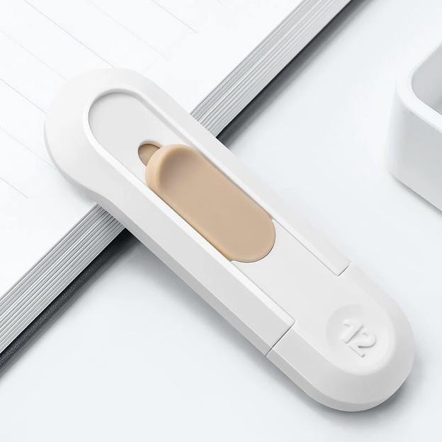 Нож канцелярский Deli ENS065-WH ENS065 шир.лез.12мм пластик белый фото 3