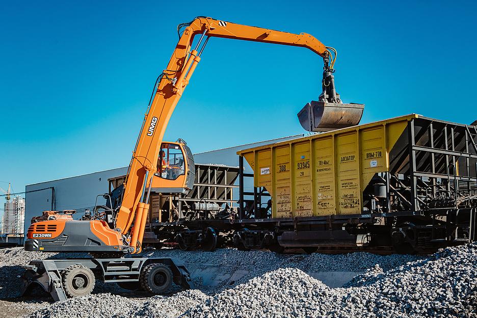 Экскаватор-перегружатель (промышленный перегружатель) на колёсном ходу Е230WН фото 4
