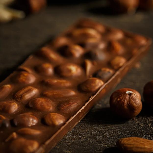 Молочный шоколад Kreola с фундуком, миндалем, арахисом, плитка 60 г, опт фото 6