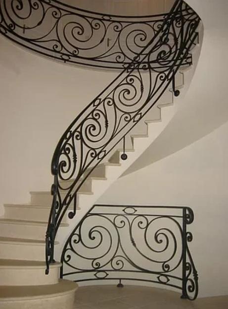 Кованые перила для поворотной лестницы под заказ фото 1