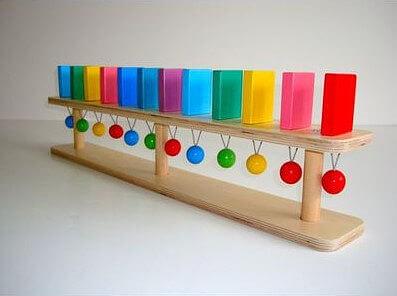 Тактильно-развивающая панель «Разноцветное домино» 12 домино фото 1