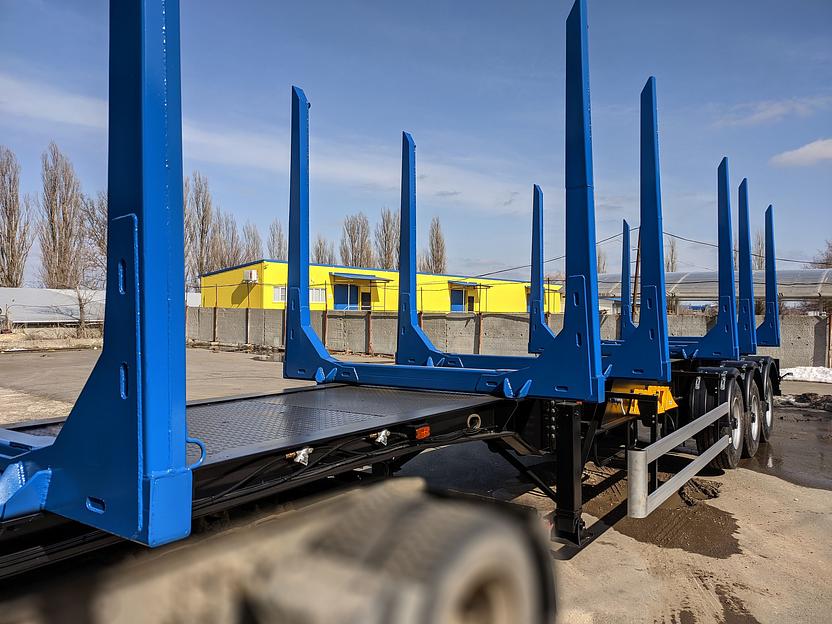 Полуприцеп сортиментовоз трехосный фото 3