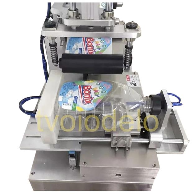 Этикетировщик для овальной тары фото 2