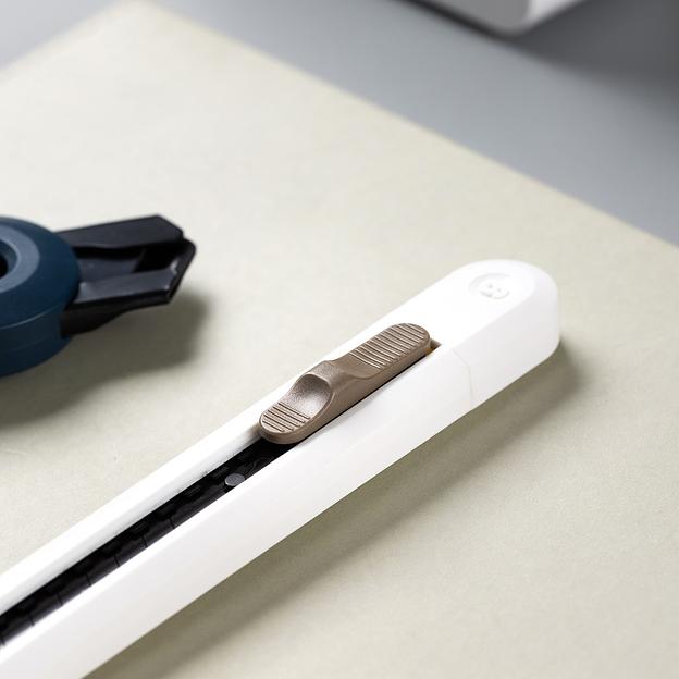 Нож канцелярский Deli ENS063-WT Nusign шир.лез.9мм фиксатор сталь белый фото 6