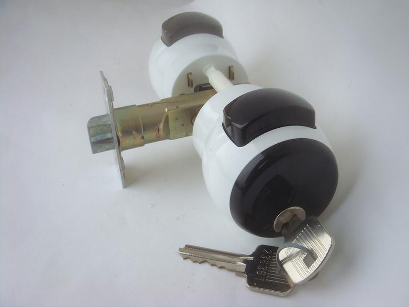 Ручка дверная «круглая» с нажимной кнопкой неповоротная с трубчатым механизмом замка, опт фото 1