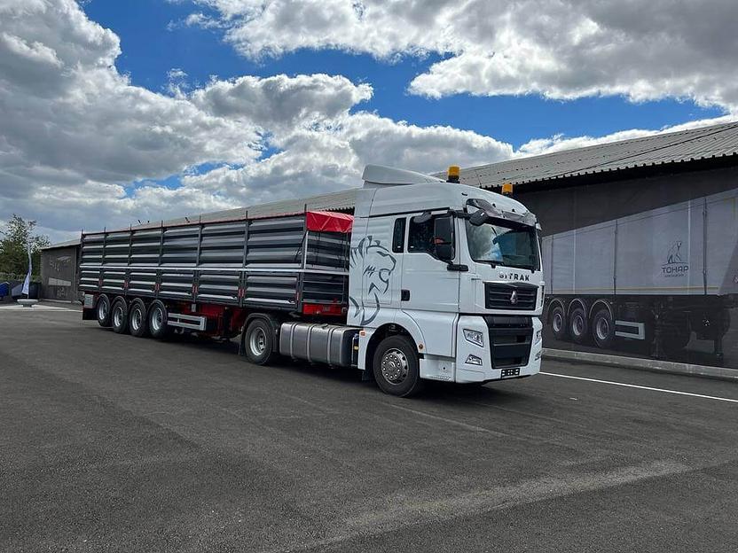 Полуприцеп-Зерновоз бортовой Тонар 9989 60 куб.м 4 оси фото 2