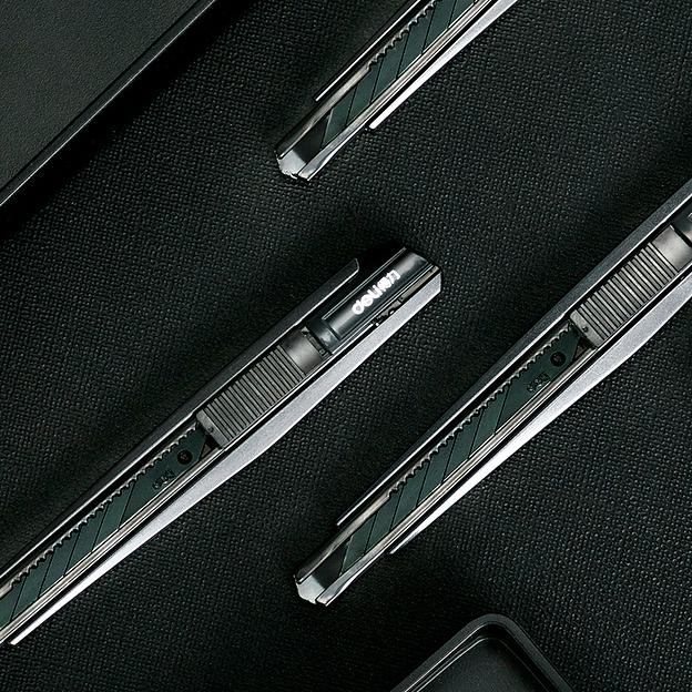 Нож канцелярский Deli 2037S шир.лез.9мм выдвижное лезвие фиксатор сталь серый фото 2