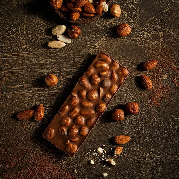 Молочный шоколад Kreola с фундуком, миндалем, арахисом, плитка 60 г, опт фото 8