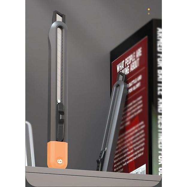 Нож Deli Технический нож "Home Series Gray" Deli HT4009C ширина лезвия 9мм, эксклюзивный дизайн, корпус из высококачественного софттач пластика фото 3