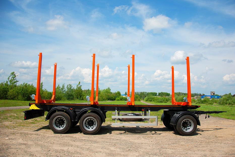 Прицеп сортиментовоз трехосный фото 1