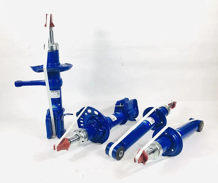 Стойки передней подвески масляные Demfi на LADA Granta  фото 1