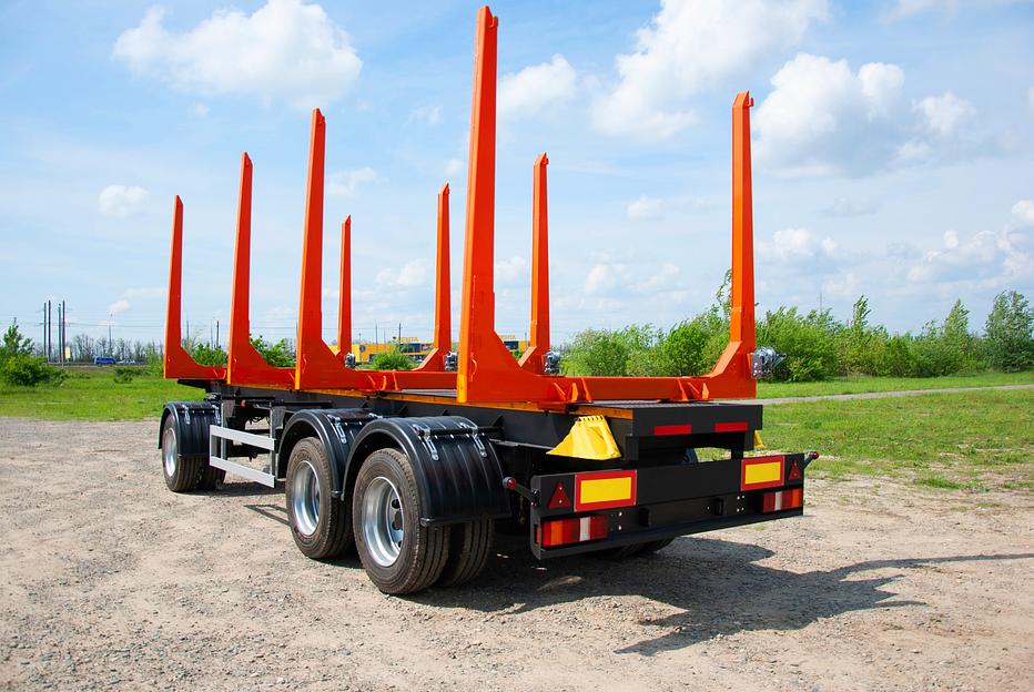 Прицеп сортиментовоз трехосный фото 3