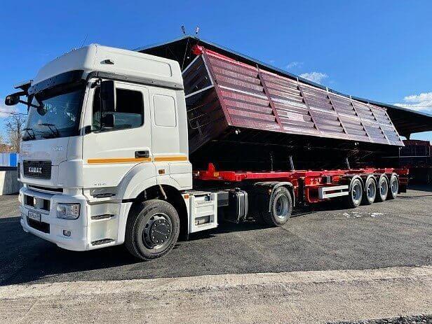 Полуприцеп-Зерновоз Самосвал (правый свал) с высоким бортом Тонар 9989 60 куб.м 4 оси фото 1
