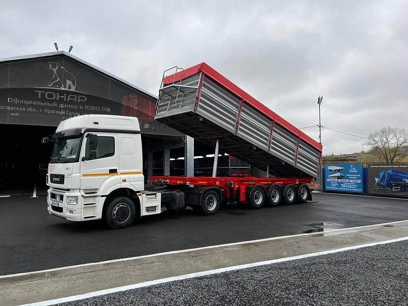 Полуприцеп-Зерновоз Самосвал (свал право/лево/назад) Тонар 9988 45 куб.м 4 оси фото 1