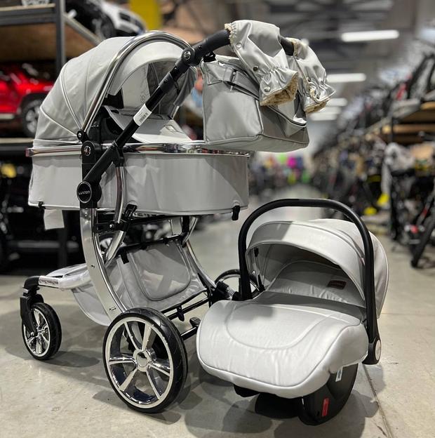 Детское 4-х колесное шасси-трансформер Luxmom 608 3в1 серебристая экокожа 2023 ОПТ фото 1