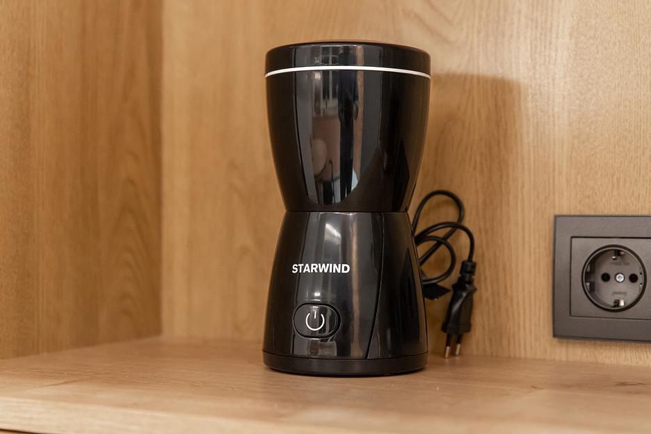 Кофемолка Starwind SGP8426 200Вт сист.помол.:ротац.нож вместим.:80гр черный фото 10