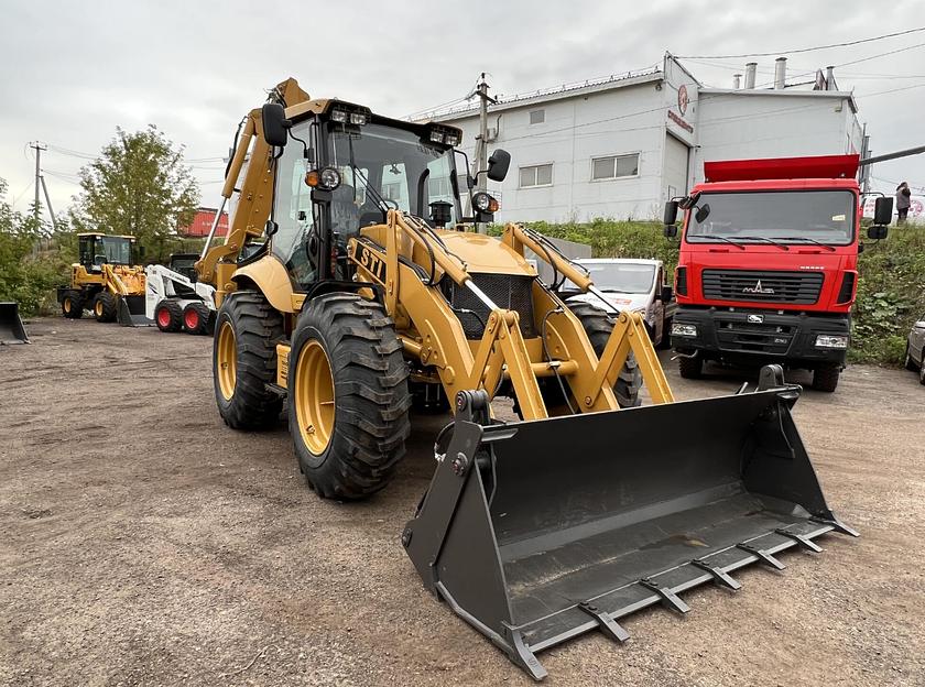 Экскаватор-погрузчик «STI 4CX» фото 1