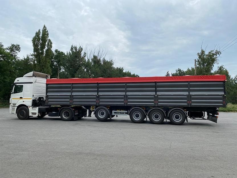 Полуприцеп-Зерновоз бортовой Тонар 99892 60 куб.м 3+1 ось фото 3