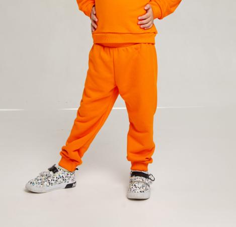 Брюки детские из футера цвет оранжевый ОПТ фото 1
