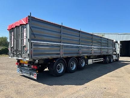 Полуприцеп-Зерновоз Самосвал Тонар 99881 58 куб.м 3 оси фото 3