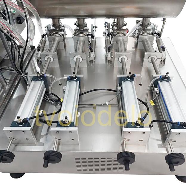 Настольная поршневая машина розлива фото 6