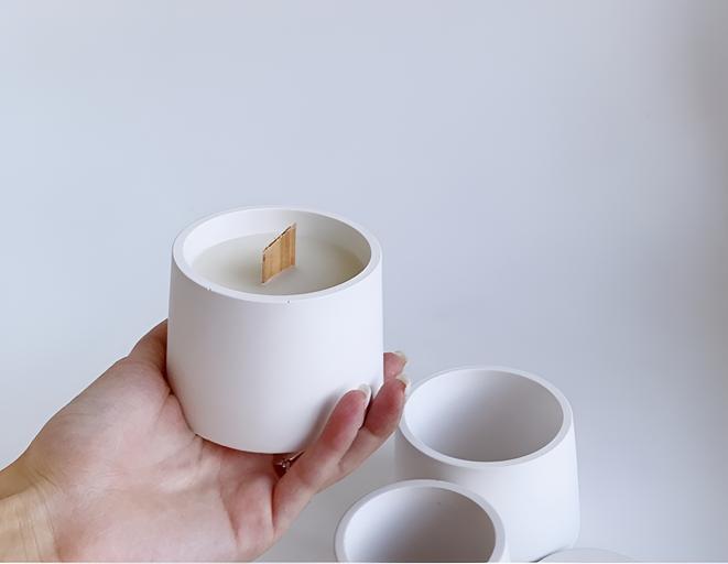 Candle made of coconut wax Razzo room “Cone M” in a plaster candle holder OPT фото 1