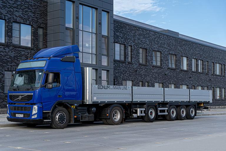 Бортовой полуприцеп 13,62 м с вынесенной осью 914295-06 фото 3