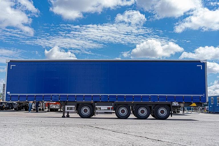 Шторный полуприцеп 13,62 м с вынесенной осью 914295-04 фото 7