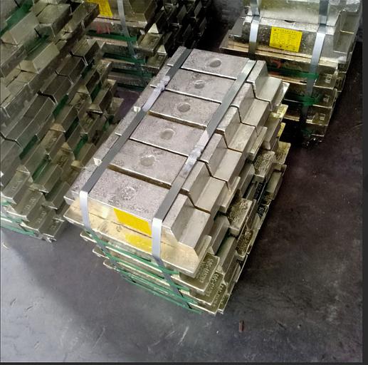 Tin in industrial ingots weighing 25 kg, chemical purity 99.99% OPT фото 1