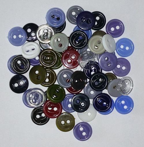 Пуговицы прокольные пластмассовые 10-12 мм круглые 1000 шт ОПТ фото 1