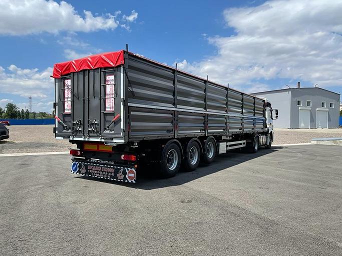 Полуприцеп-Зерновоз бортовой Тонар 99881 60 куб.м 3 оси фото 3