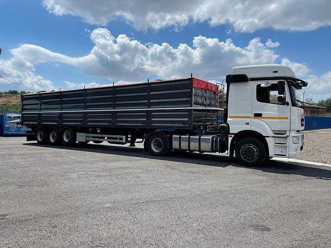 Полуприцеп-Зерновоз бортовой Тонар 99881 60 куб.м 3 оси фото 4