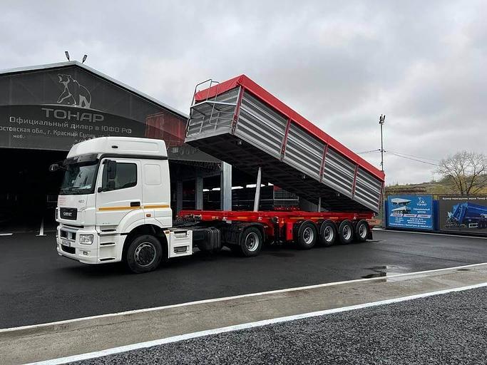 Полуприцеп-Зерновоз Самосвал (свал право/лево/назад) Тонар 9988 45 куб.м 4 оси фото 1