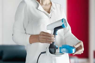 Отпариватель ручной Tefal DT7000E0 1100Вт белый/синий фото 5