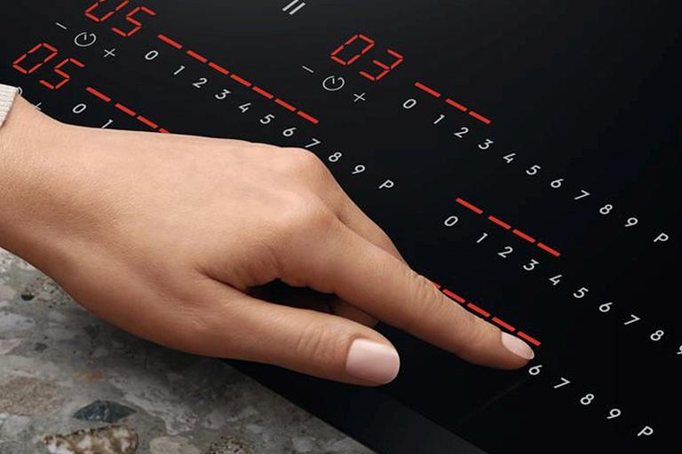 Индукционная варочная поверхность Electrolux EIV84550 черный фото 7