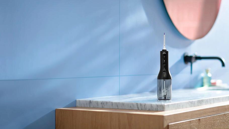 Ирригатор Philips HX3826/33 импульсн. черный фото 4