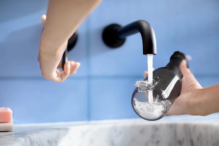 Ирригатор Philips HX3826/33 импульсн. черный фото 7